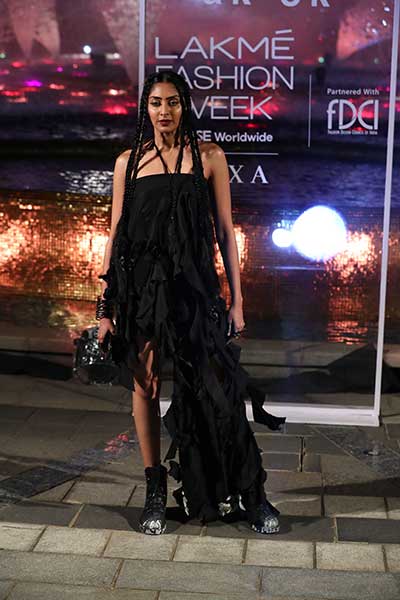 Models showcase designer Anamika Khanna's line of clothing at the Lakme Fashion Week