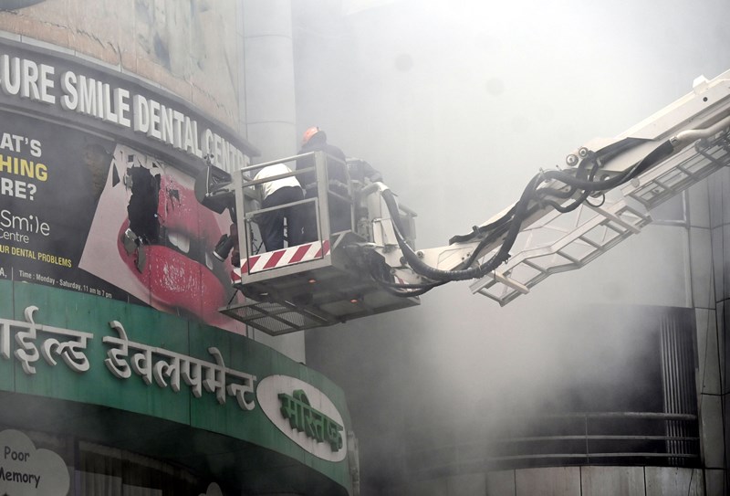 Firefighters rescue child patients after fire breaks out at Ahmedabad hospital