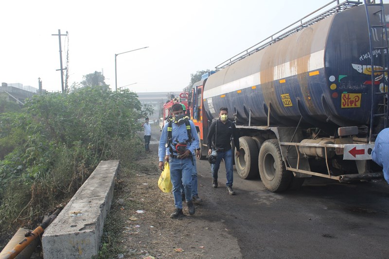 Officials clearing the site of chemical leak from tanker in Gujarat's Surat