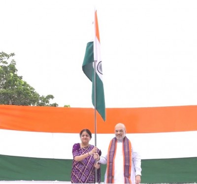 Har Ghar Tiranga campaign: Home Minister Amit Shah hoists tricolour atop his residence, shares selfie