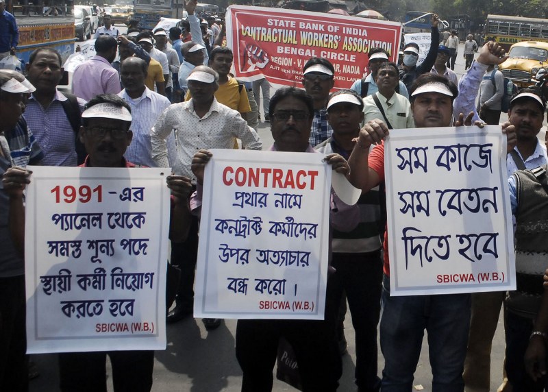 Members of State Bank of India Contractual Workers Association participate in Kolkata rally