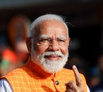 Narendra Modi casts his vote in Gujarat in third phase of Lok Sabha polls