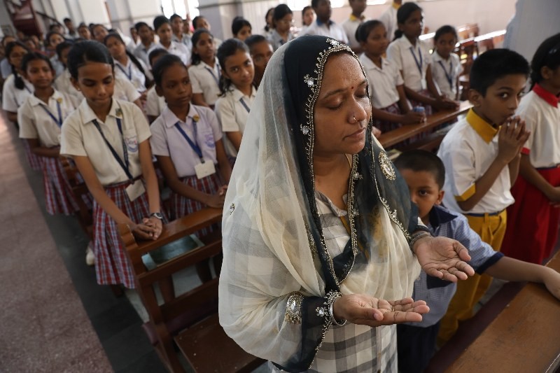In Images: Students, teachers attend a Mass ahead of Pope Francis' funeral at St. Ignatius Church in Kolkata