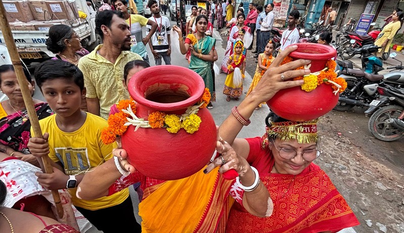 In Images: Devotees perform in north Kolkata as they proceed to fetch holy water for Jagannath Snan Yatra