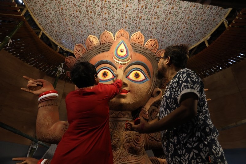 In Images: Sanatan Dinda gives finishing touches to Durga idol in Kolkata