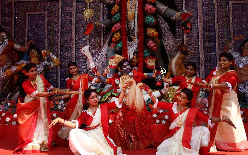 In Images: Dancers perform before Goddess Kali at a pandal in Kolkata