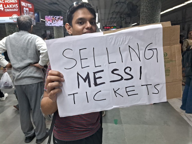 In Images: Boys sell Messi tour tickets in Kolkata