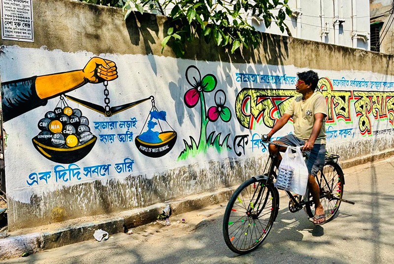 In Images: TMC’s wall paintings turn Bengal streets into election battleground