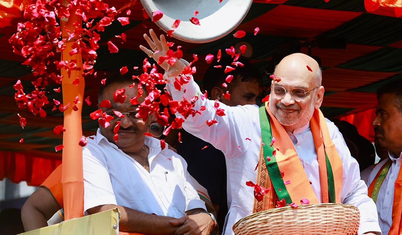 In Images: Amit Shah holds roadshow for BJP candidates in Kolkata