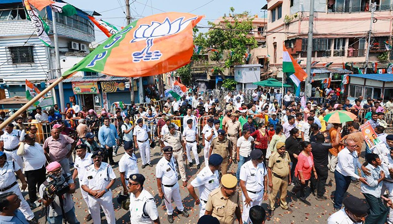 In Images: Amit Shah holds roadshow for BJP candidates in Kolkata