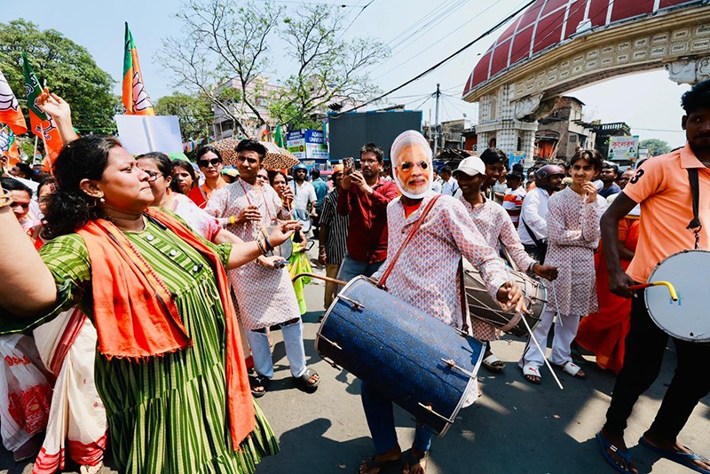 In Images: Amit Shah holds roadshow for BJP candidates in Kolkata