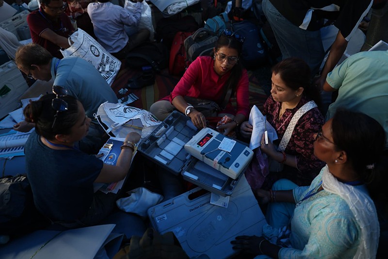 Phase 1 of Bengal polls tomorrow; polling personnel collect EVMs, other materials from a Siliguri dispersal centre