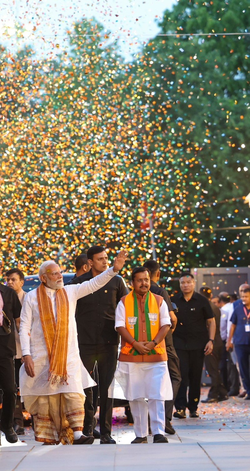 In Images: PM Modi in traditional dhoti look at BJP HQ as party celebrates sweeping electoral victory