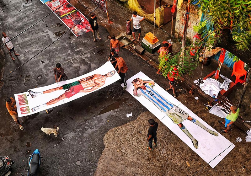 In Images: Giant Messi-Ronaldo cutouts turn a Kolkata club into a World Cup dreamland