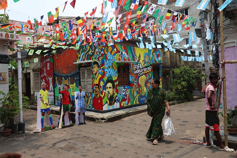 In Images: Children in Kolkata play beneath a giant World Cup masterpiece