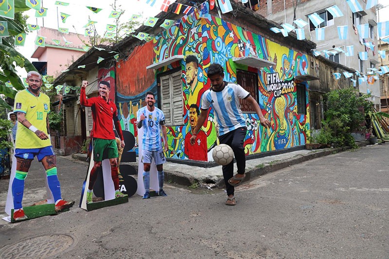 In Images: Children in Kolkata play beneath a giant World Cup masterpiece