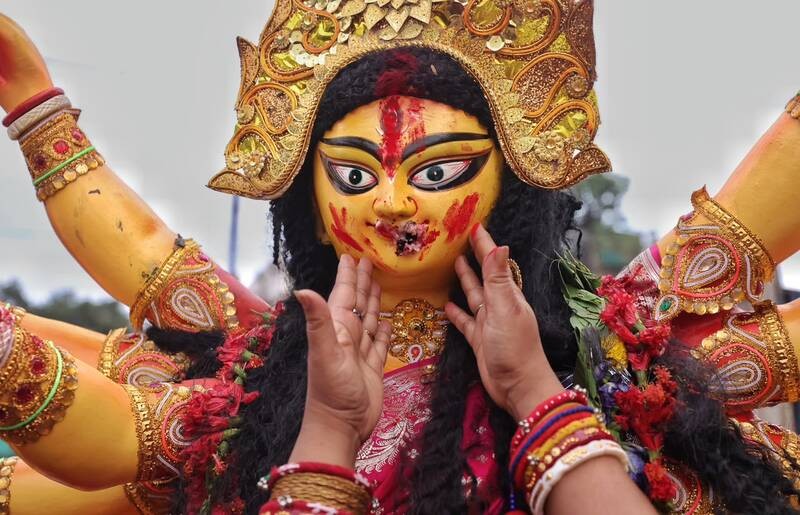 In Images: Sindoor Khela, idol immersion mark Bijoya Dashami in Kolkata