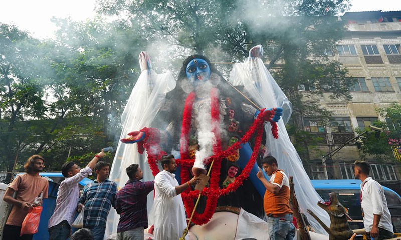 In Images: Kolkata's Fata Kesto Kali idol arrives at pandal in grand procession
