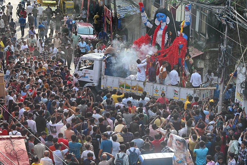 In Images: Kolkata's Fata Kesto Kali idol arrives at pandal in grand procession