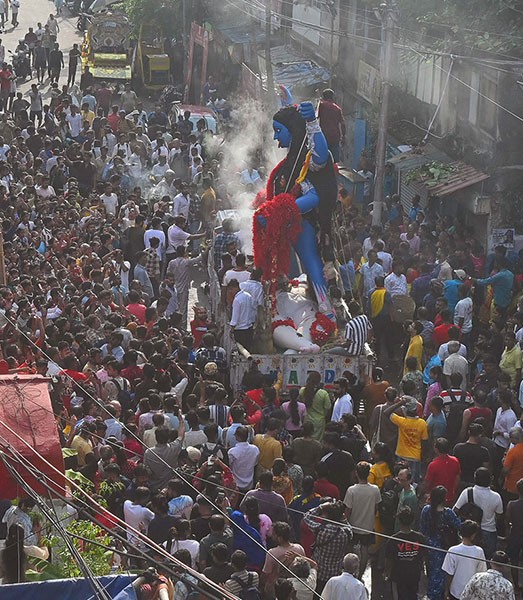 In Images: Kolkata's Fata Kesto Kali idol arrives at pandal in grand procession